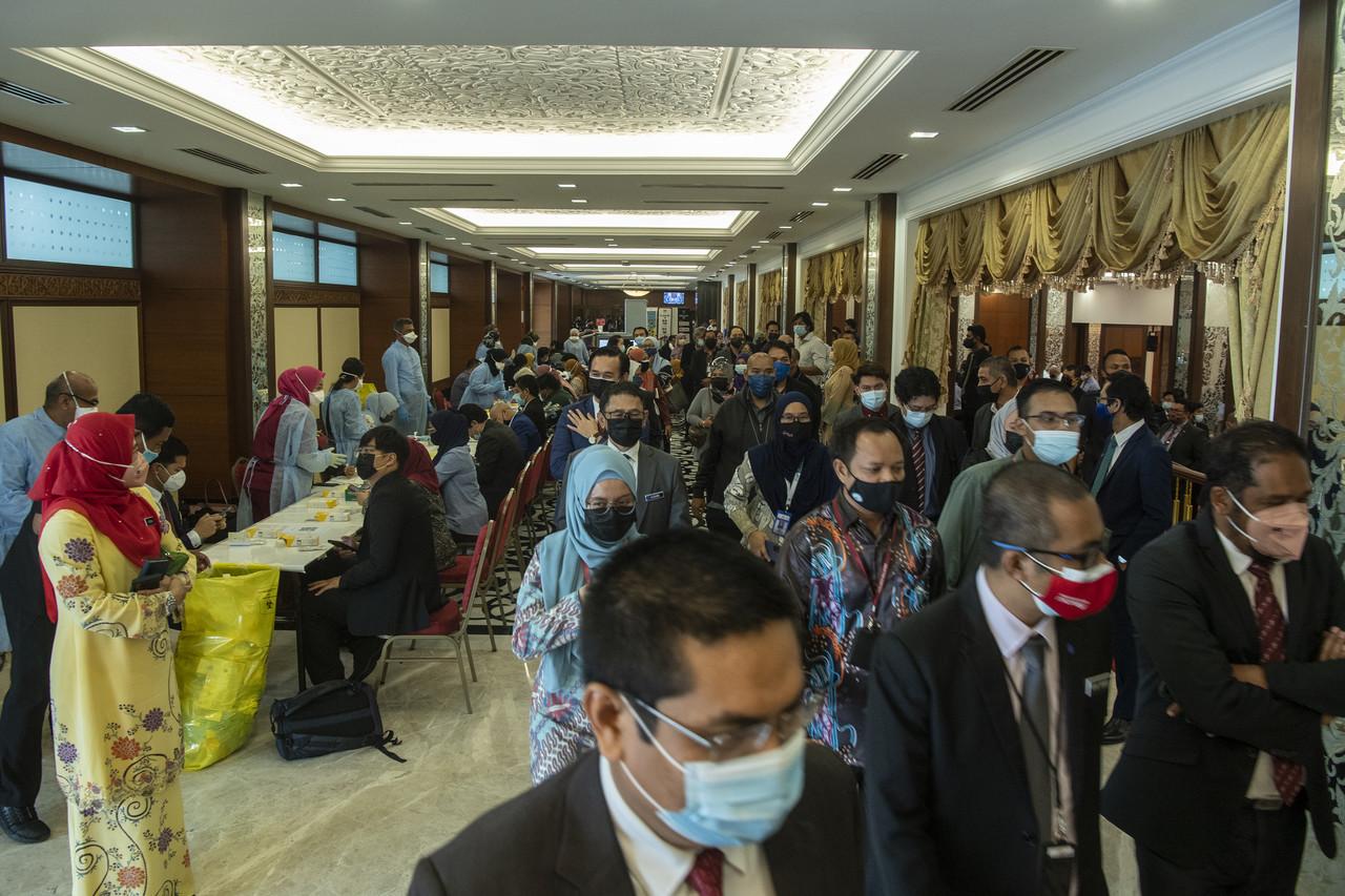 MPs and parliament staff undergo screening for Covid-19 at the Parliament building in Kuala Lumpur on July 29. Photo: Bernama
