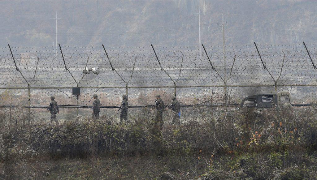 South Korean army soldiers patrol along the barbed-wire fence in Paju, South Korea, near the border with North Korea in this Nov 16, 2018 file photo. Photo: AP