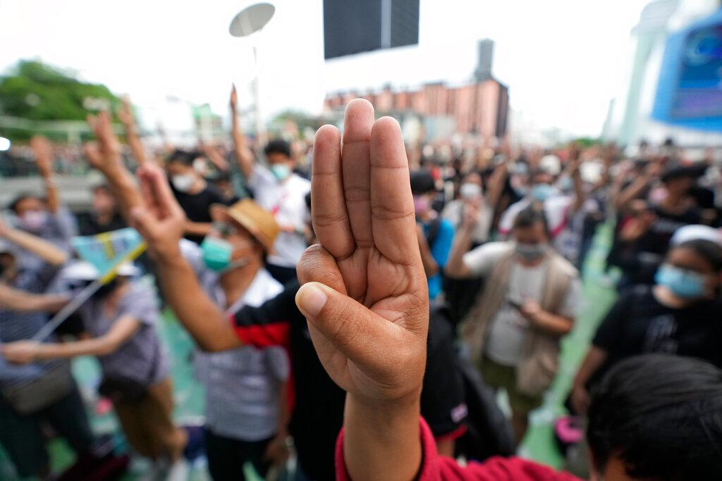 Pro-democracy supporters display the three-finger symbol of resistance during a demonstration in Bangkok, Thailand, June 24. Photo: AP