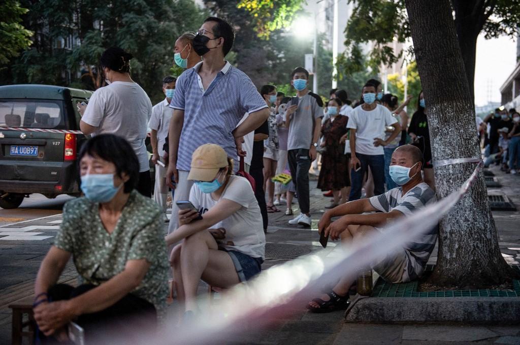 Residents queue to be tested for Covid-19 in Wuhan in China's central Hubei province, Aug 3. Photo: AFP