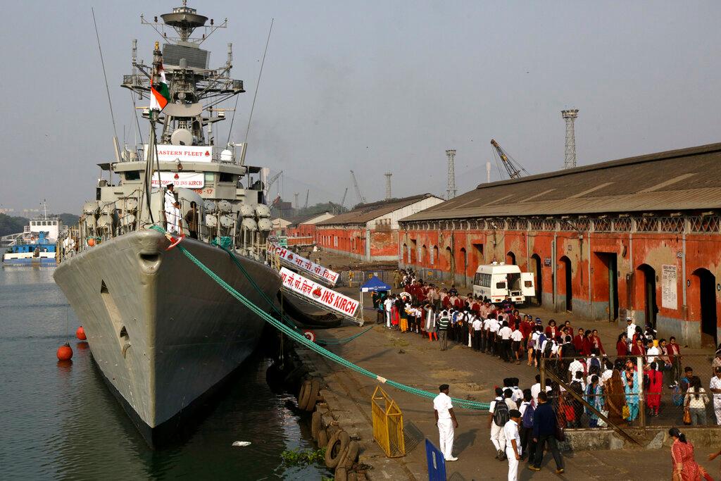 In this Dec 5, 2019, file photo, schoolchildren walk past the visiting Indian navy warship INS Kirch for a guided tour in Kolkata, India. India is sending four navy ships for exercises and port visits with other countries to strengthen cooperation in the Indo-Pacific region, its navy says. Photo: AP