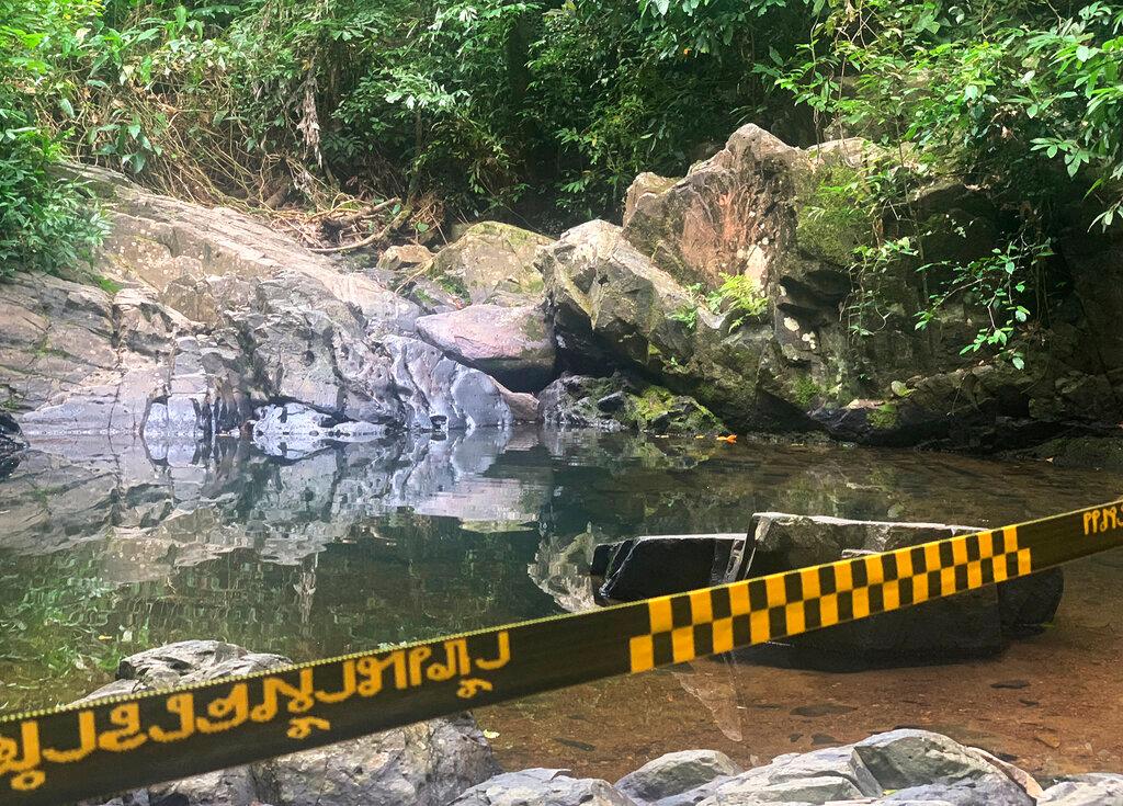 Police tape cordons off the area where a woman was found dead a day earlier at a secluded spot on the southern island of Phuket, Thailand, on Aug 6. Photo: AP