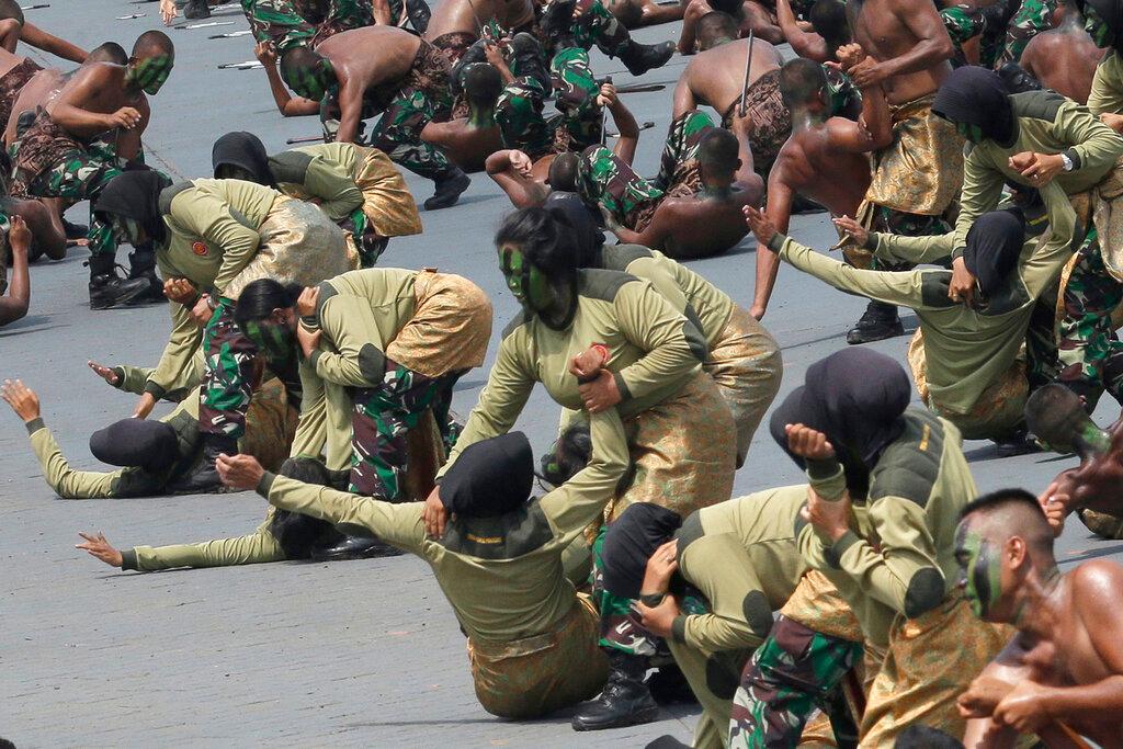 In this Oct 5, 2017, file photo, female members of Indonesian army show their martial arts skills during a parade marking the 72nd anniversary of the Indonesian Armed Forces in Cilegon, Banten, Indonesia. Photo: AP