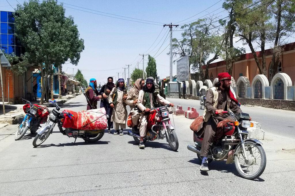Taliban fighters patrol inside the city of Ghazni, southwest of Kabul, Afghanistan, Aug 12. The Taliban captured the provincial capital near Kabul on Thursday, the 10th the insurgents have taken over a weeklong blitz across Afghanistan. Photo: AP
