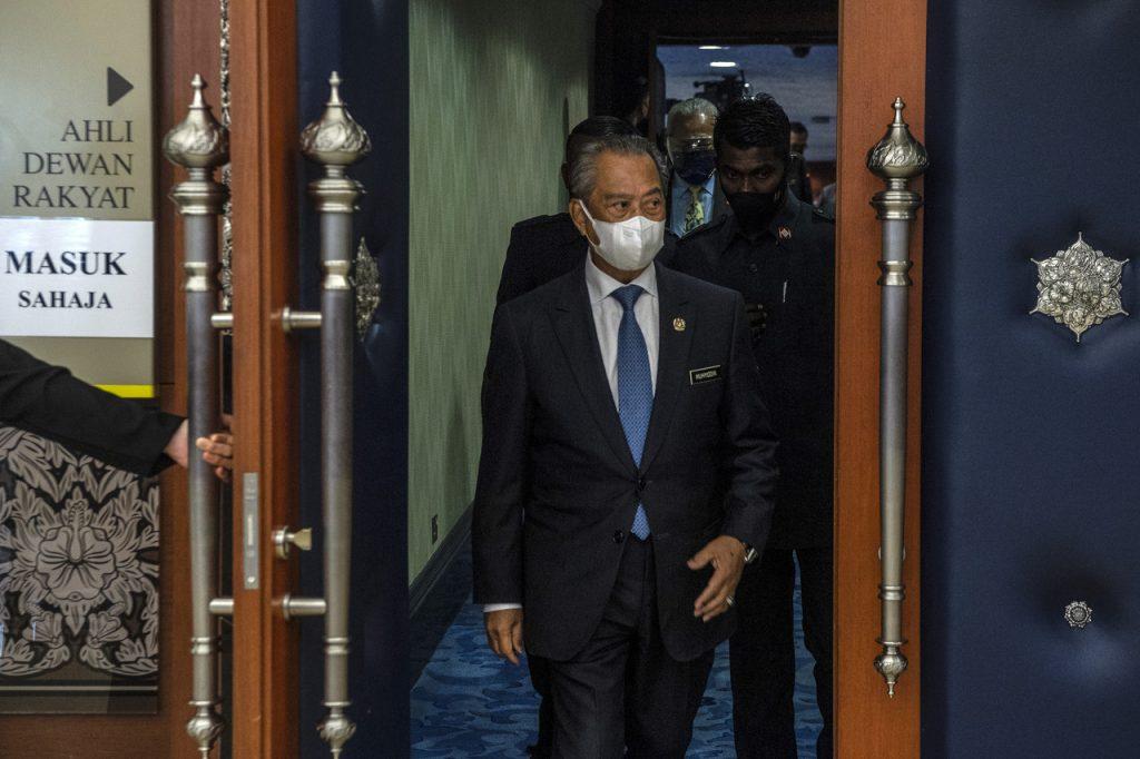 Prime Minister Muhyiddin Yassin leaves the Dewan Rakyat after presenting the National Recovery Plan at the special parliamentary sitting on July 26. Photo: Bernama