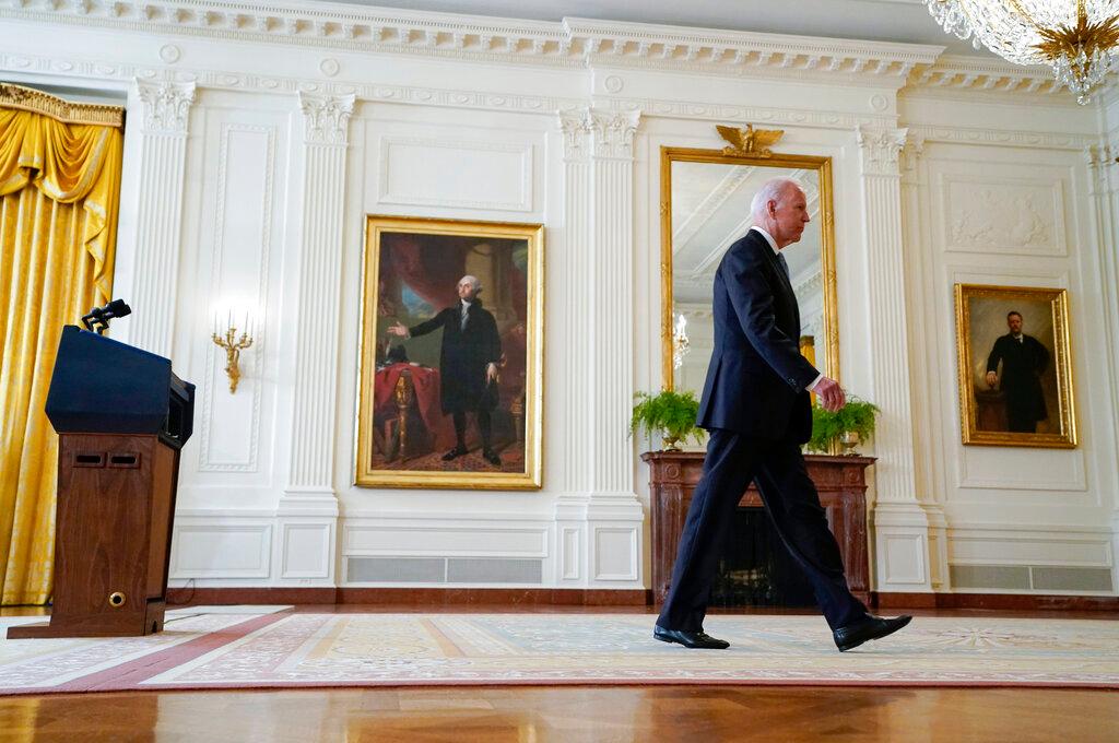 US President Joe Biden walks from the podium after speaking about Afghanistan at the White House in Washington, Aug 16. Photo: AP
