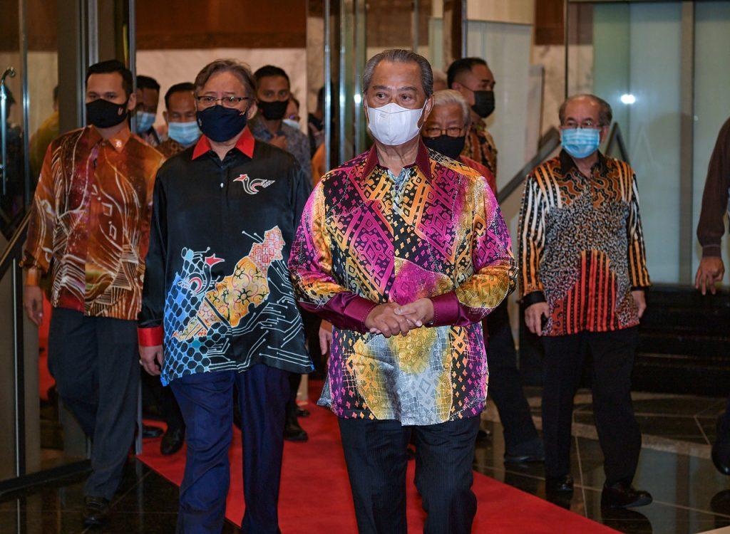 Prime Minister Muhyiddin Yassin with Sarawak Chief Minister Abang Johari Openg (second left) at a state dinner in Kuching during an official visit to Sarawak earlier this year. Photo: Bernama