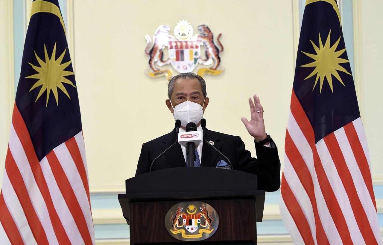Muhyiddin Yassin speaks at a press conference on his last day as prime minister on Aug 16. Photo: Bernama