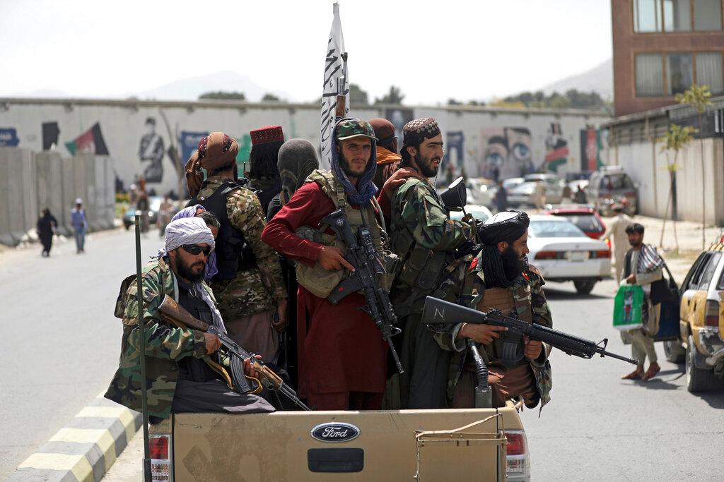Taliban fighters patrol in Kabul, Afghanistan, in this photo taken Aug 19. Despite statements indicating that the current group of Taliban leaders could be more moderate, there is little expectation that they have changed in their interpretation of the shariah. Photo: AP