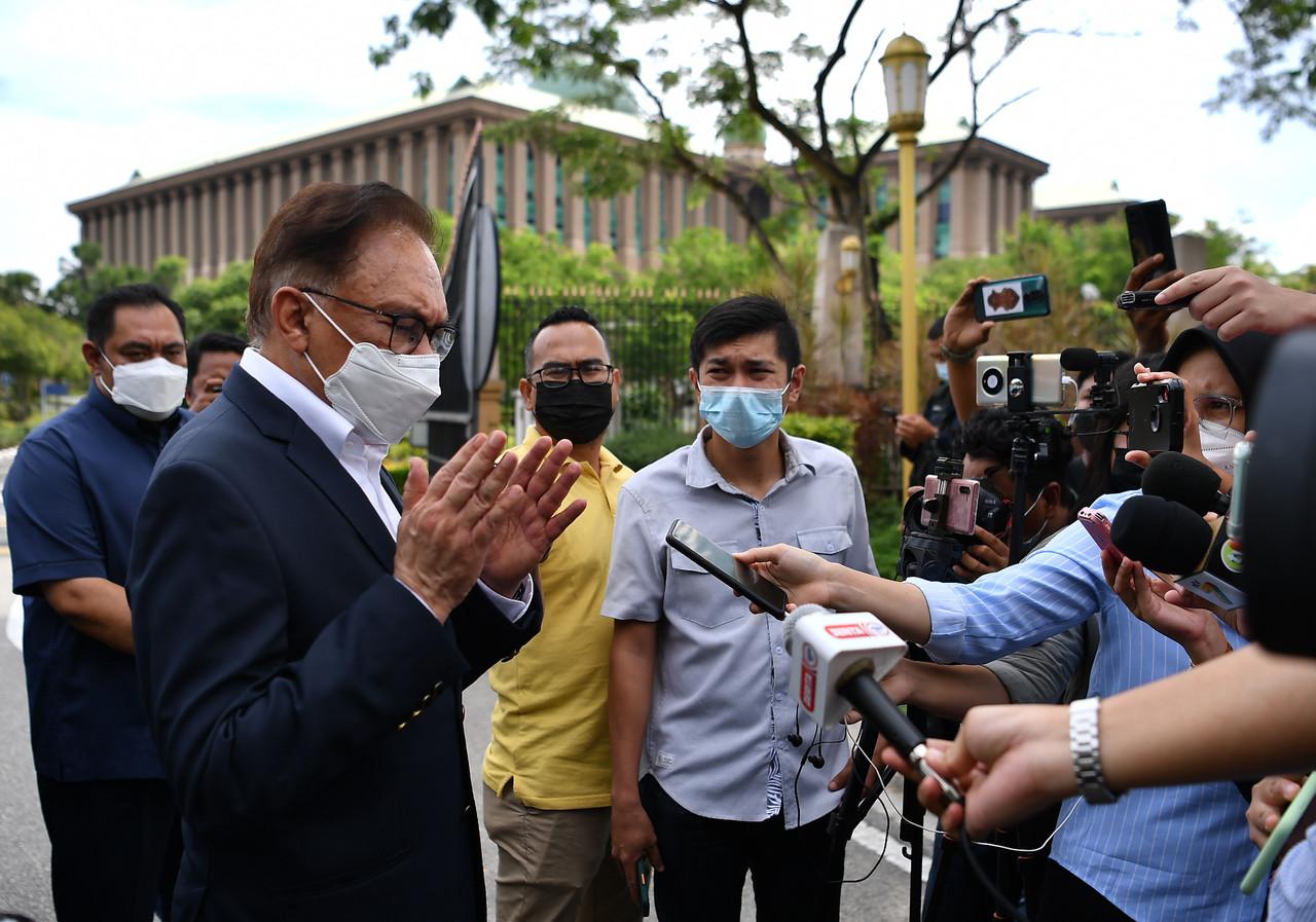 Pakatan Harapan chairman Anwar Ibrahim speaks to reporters after a meeting at the Prime Minister's Office in Putrajaya today. Photo: Bernama