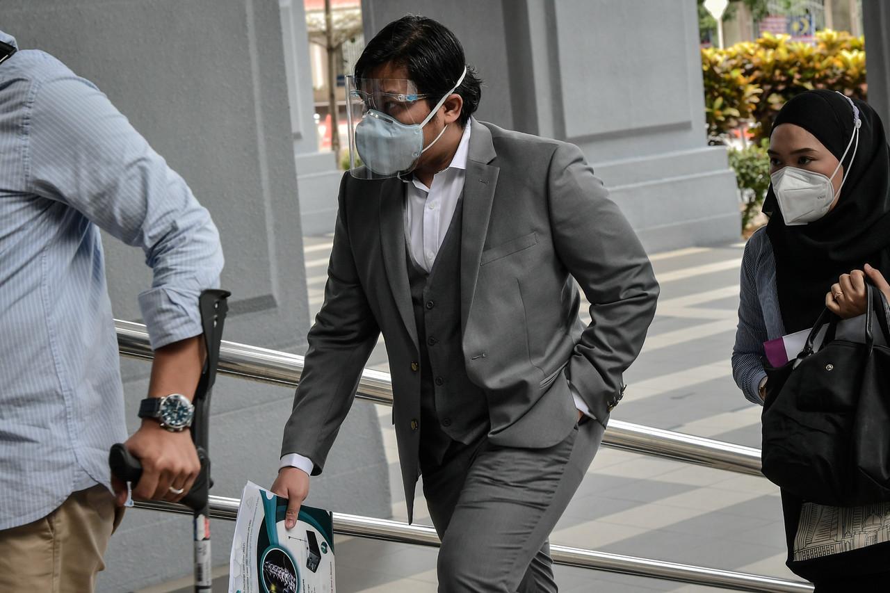 Dr Mohd Shahir Anuar from Avisena Specialist Hospital arrives at the court complex in Kuala Lumpur today. Photo: Bernama