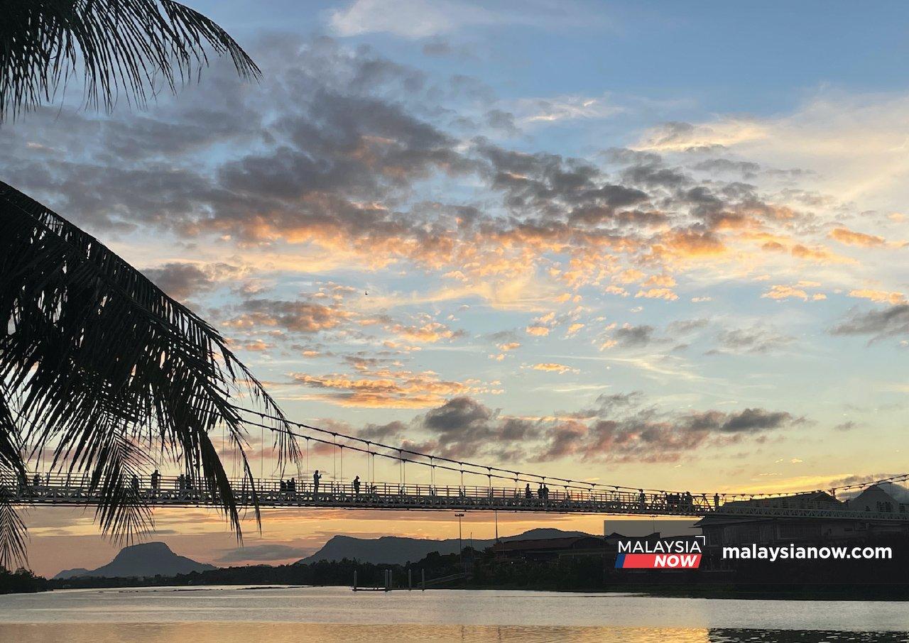 The Satok Suspension Bridge which was rebuilt in recent years after collapsing in 2004.