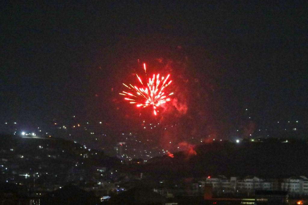 Celebratory gunfire lights up part of the night sky after the last US aircraft took off from the airport in Kabul early on Aug 31. Photo: AFP