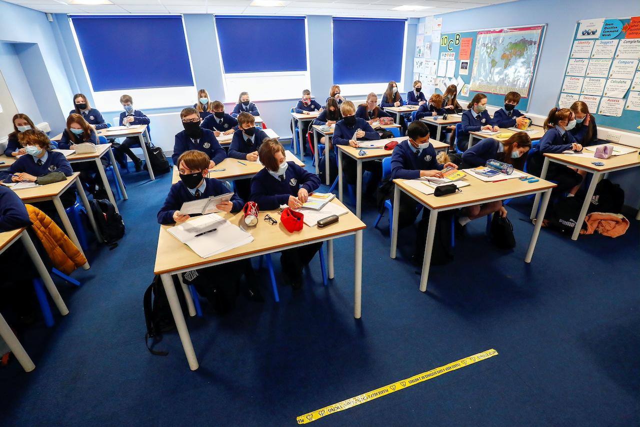 Students attend a lesson at a school in Cheshire, Britain, in this March 9 file photo. Photo: Reuters