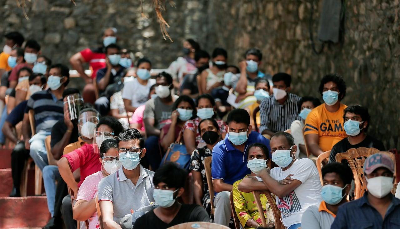 People wait to receive their doses of Sinopharm vaccine against Covid-19 in Colombo, Sri Lanka Aug 20. Photo: Reuters