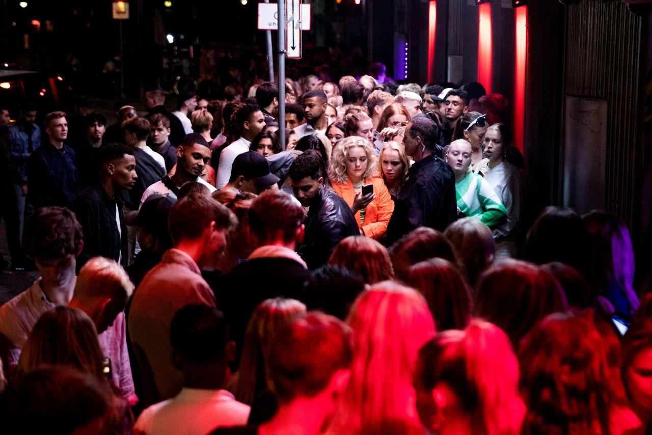 Nightlife guests gather in front of a club after the Covid-19 shutdown, in Copenhagen, Denmark, in this picture released Sept 3. Photo: Reuters