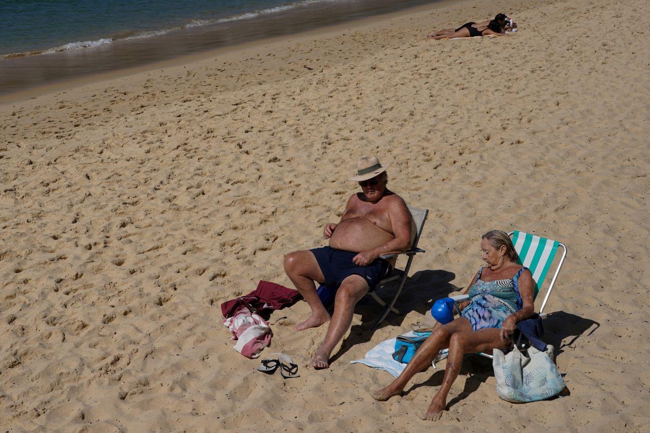 Beachgoers enjoy a sunny day at Balmoral Beach during a lockdown to curb the spread of the Covid-19 outbreak in Sydney, Australia, Sept 8. Photo: Reuters