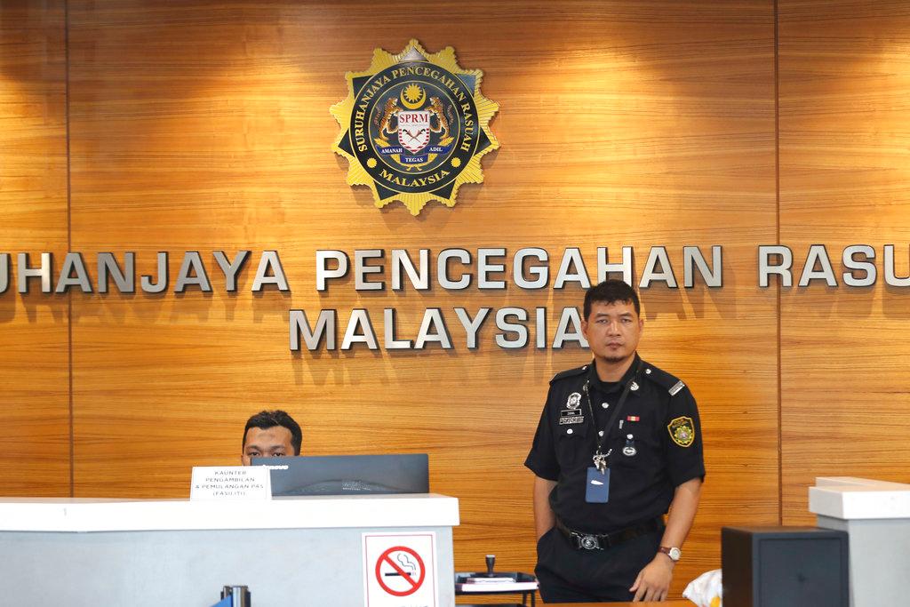 The Malaysian Anti-Corruption Commission says it will not protect any officer found to be involved in criminal acts. Photo: AP
