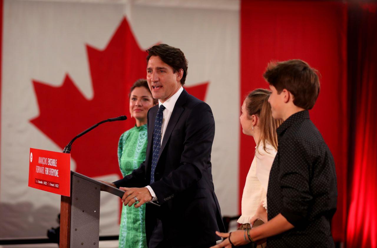 Canada's Liberal Prime Minister Justin Trudeau, accompanied by his wife and his children greet supporters during the Liberal election night party in Montreal, Quebec, Canada, Sept 21. Photo: AP