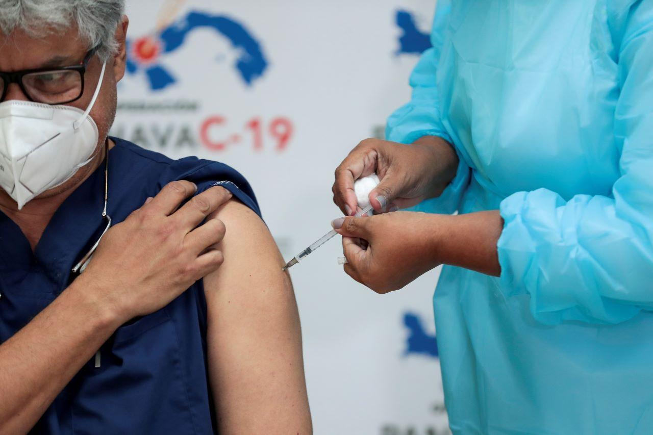 Vaccinations took around 140 days to get the first billion doses into people's arms. Photo: Reuters