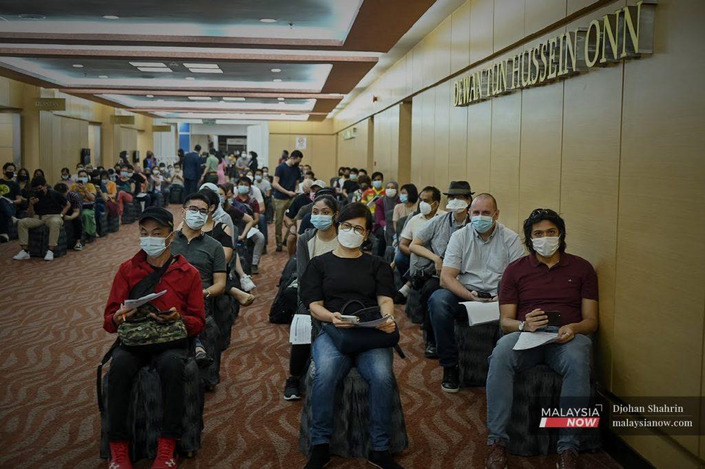 Residents in Selangor and Kuala Lumpur who volunteered to receive the AstraZeneca vaccine for Covid-19 wait for their turn at the World Trade Centre in Kuala Lumpur in this May 5 file photo.