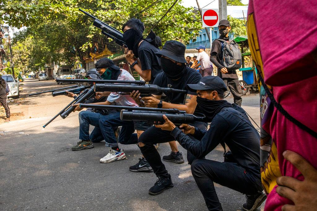 In this April 3, file photo, anti-coup protesters line in formation with homemade air rifles during a demonstration against the military coup in Yangon, Myanmar. Anti-coup fighters say telecommunications services where clashes with the military have been fierce have been down since the early hours of the day. Photo: AP