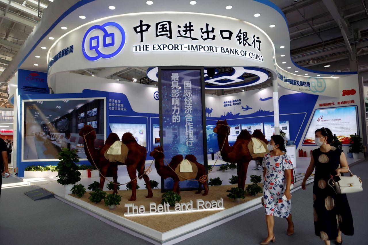Women walk past a Belt and Road display at the Export-Import Bank of China booth at the 2021 China International Fair for Trade in Services in Beijing, China Sept 3. Photo: Reuters
