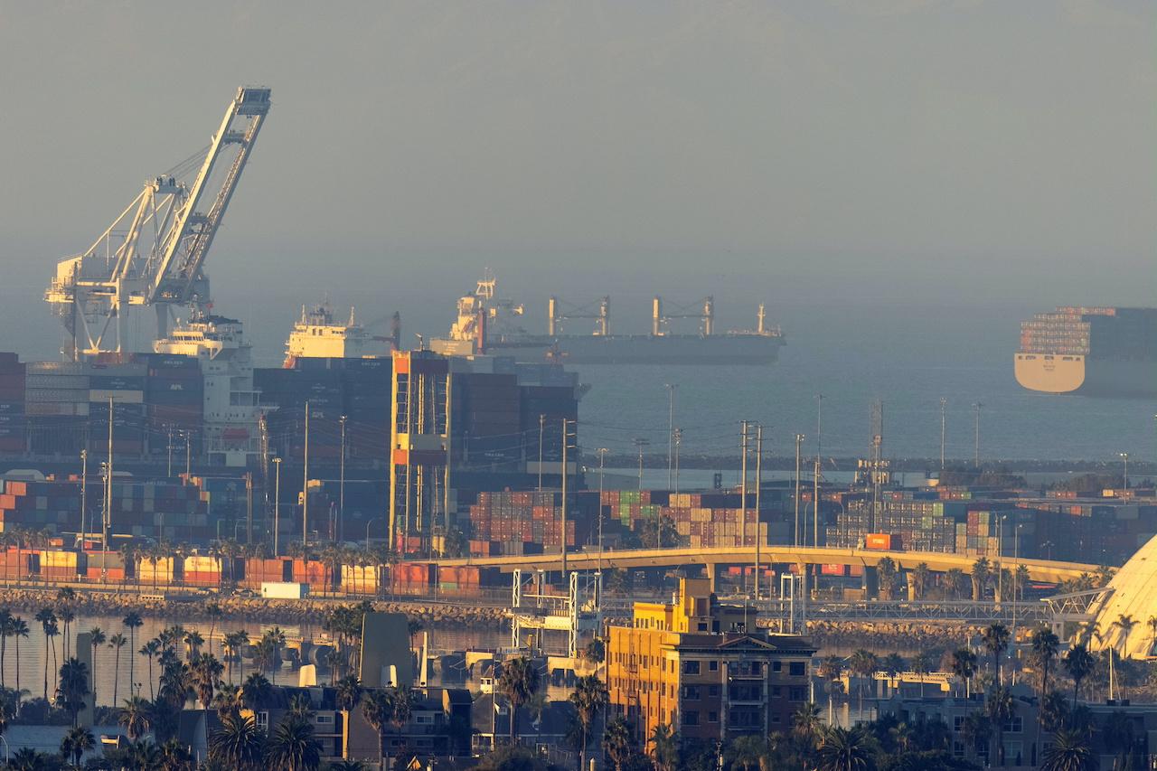Cargo container ships wait to unload at Long Beach in California, Sept 22. The disruptions to the global economy during the pandemic have upset supply chains across continents, leaving the world short of a plethora of goods and services. Photo: Reuters