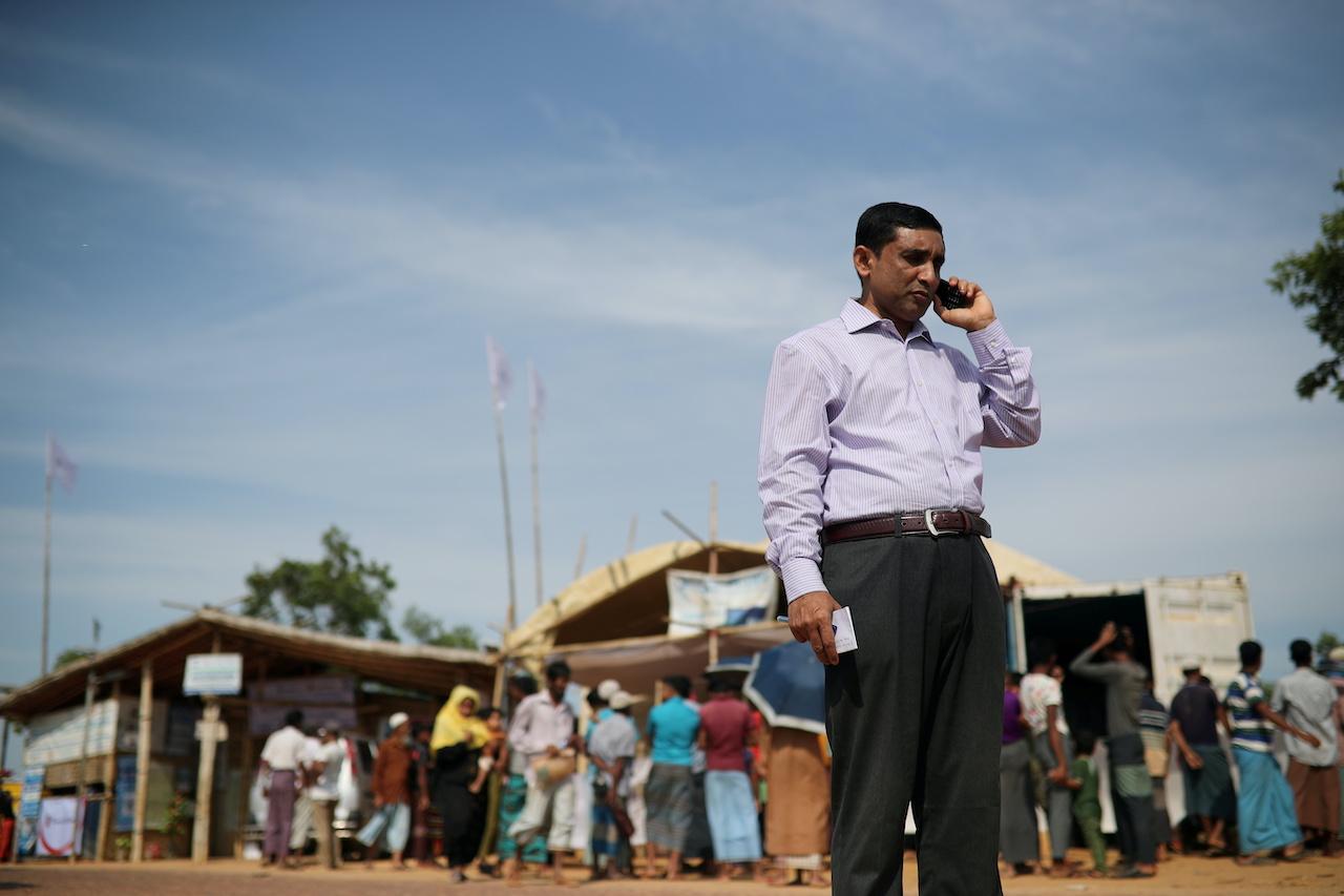 Mohib Ullah, the leader of Arakan Rohingya Society for Peace and Human Rights, talks on the phone in Kutupalong camp in Cox's Bazar, Bangladesh, in this April 7, 2019 file photo. Photo: Reuters