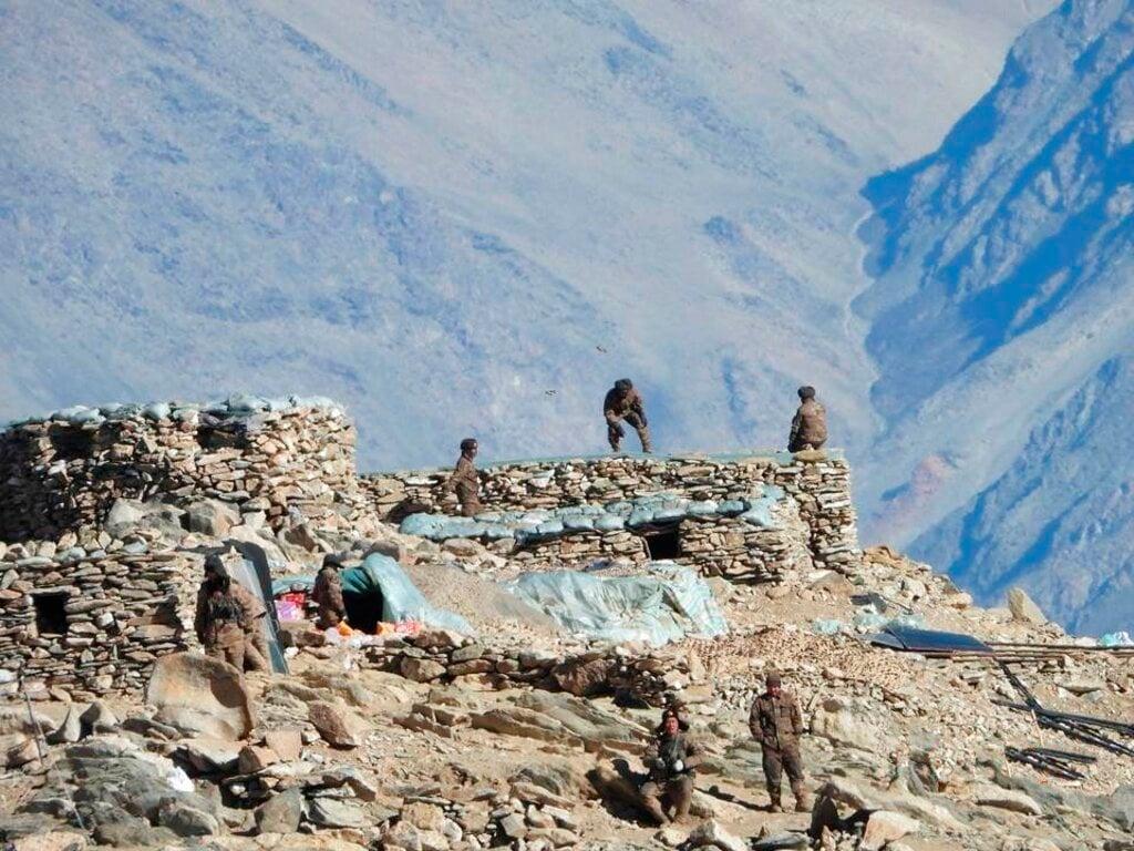 This photograph provided by the Indian army is said to show Chinese troops dismantling their bunkers at Pangong Tso region, in Ladakh along the India-China border in this file photo dated Feb 15. India and China, which fought a full-scale border war in 1962, have long accused each other of trying to take territory along their unofficial border known as the Line of Actual Control. Photo: AP