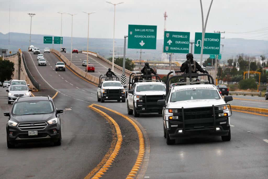 Members of the National Guard patrol the Zacatecas-Fresnillo highway after a series of recent attacks and clashes between criminal groups, in Zacatecas state, Mexico, in this file photo dated July 13. Photo: AP