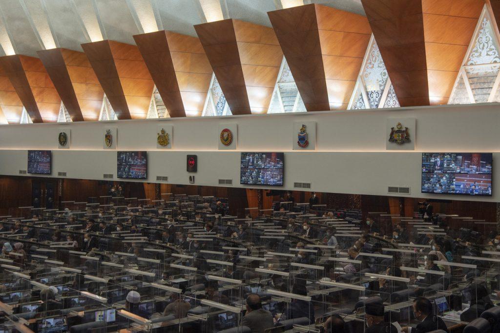 MPs are now allowed to remove their face masks while debating in the Dewan Rakyat although they must immediately put them on again once they are done speaking. Photo: Bernama