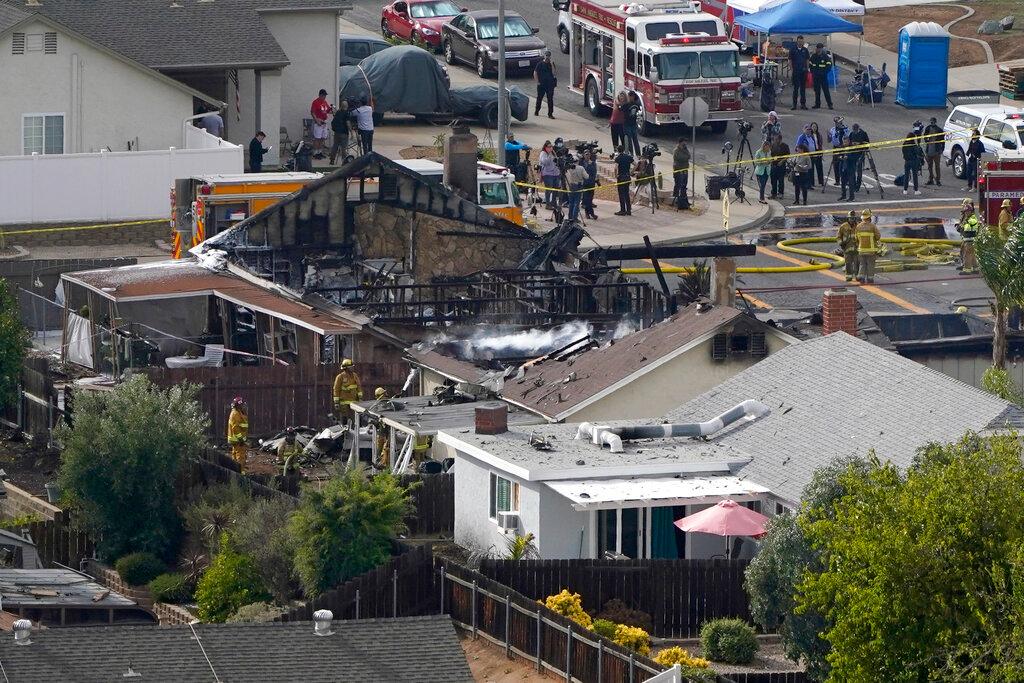 Emergency crews work the scene of a small plane crash, Oct 11, in Santee, California. Photo: AP