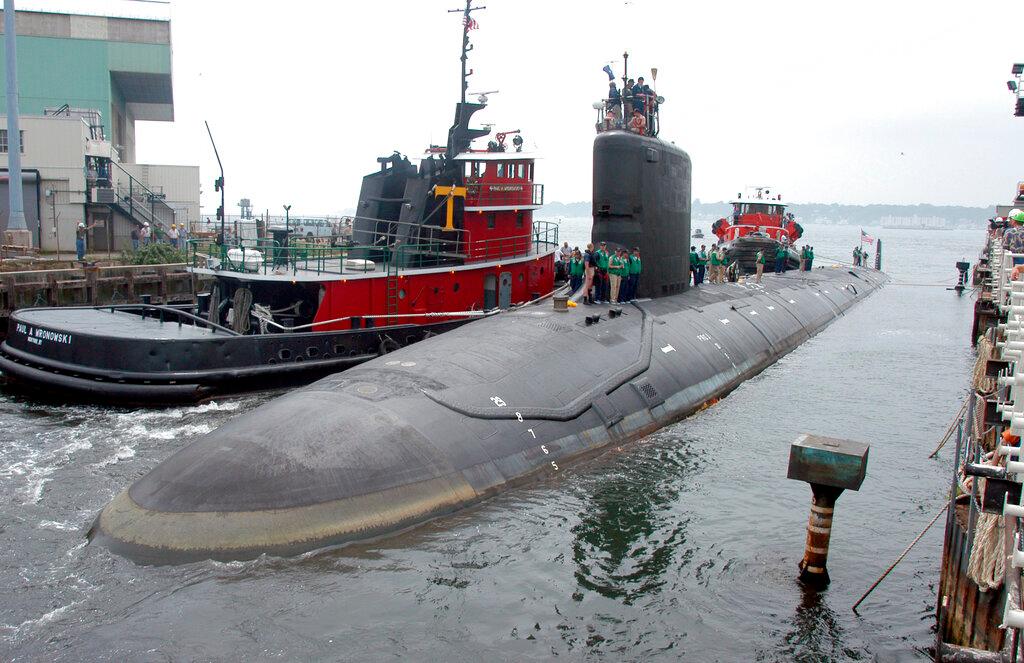 In this Friday, July 30, 2004 file photo, the USS Virginia returns to the Electric Boat Shipyard in Groton Connecticut, after its first sea trials. Former US Navy nuclear engineer Jonathan Toebbe, with the aid of his wife, allegedly sold secrets to an undercover FBI agent posing as a foreign official over the course of several months. Photo: AP