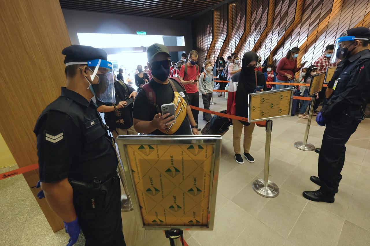 Travellers arrive at the Langkawi International Airport in this Sept 16 file photo. Photo: Bernama
