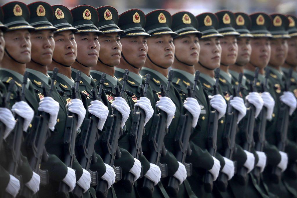 In this Oct 1, 2019, photo, Chinese People's Liberation Army soldiers march in formation during a parade. Taiwan's defence minister said last week China will be capable of mounting a 'full scale' invasion by 2025. Photo: AP