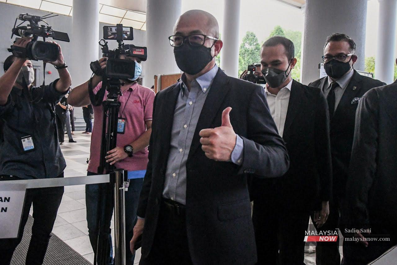 Labuan MP Rozman Isli arrives at the Sessions Court in Kuala Lumpur.