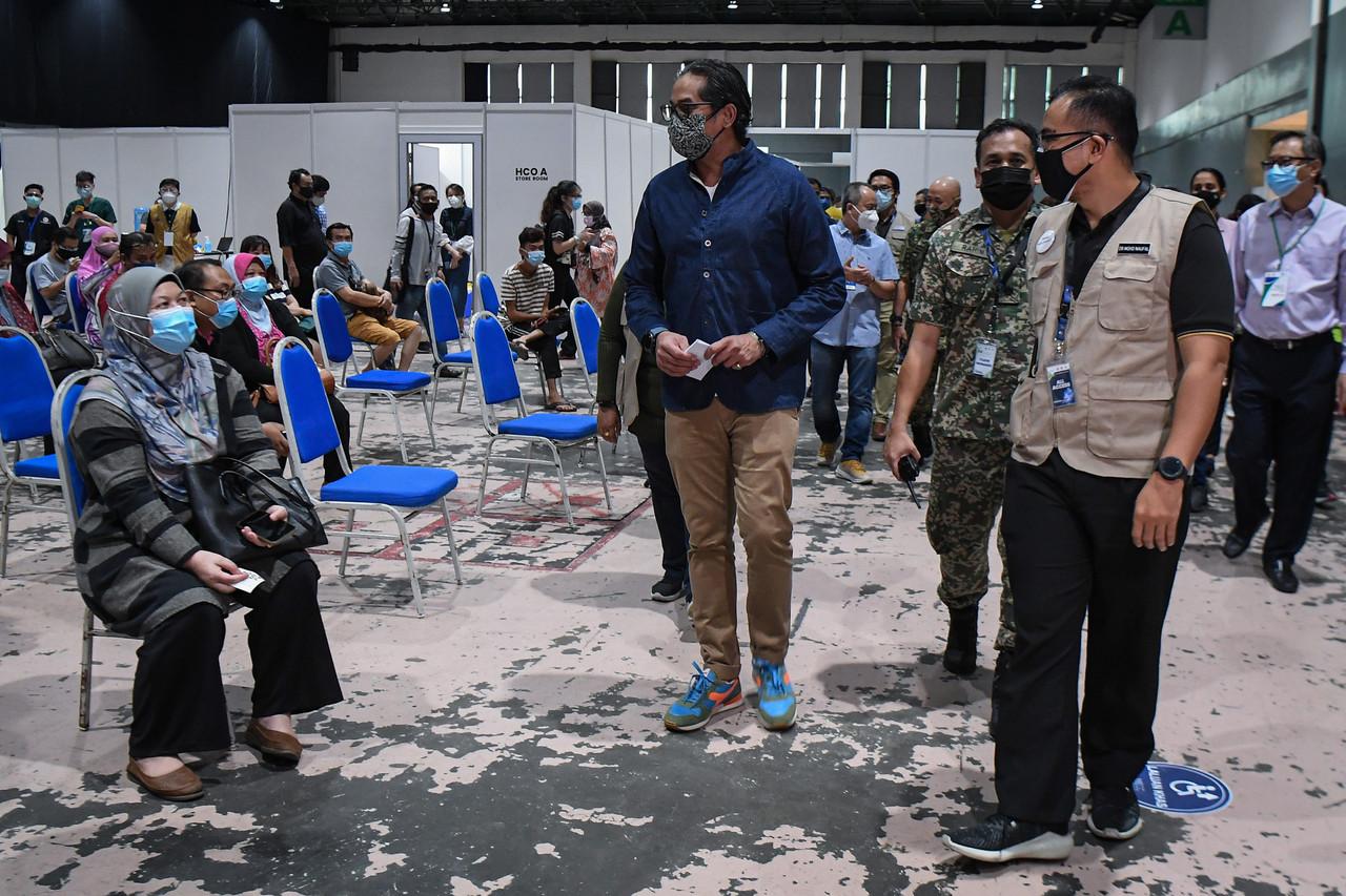 Khairy Jamaluddin chats with vaccine recipients at the mega vaccination centre at the Mines International Exhibition & Convention Centre in this July 3 file photo. Photo: Bernama
