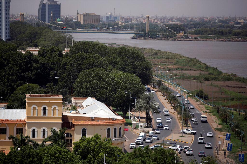 In this Sept 21, file photo, traffic moves on a street in Sudan's capital Khartoum. Military forces detained at least five senior Sudanese government figures on Oct 25 officials said, as the country's main pro-democracy group called on people to take to the streets to counter an apparent military coup. Photo: AP