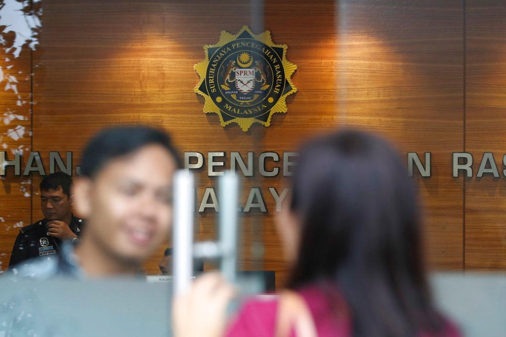 The Malaysian Anti-Corruption Commission is investigating an alleged embezzlement of government grants under Section 16(a) and Section 18 of the MACC Act 2009. Photo: AP