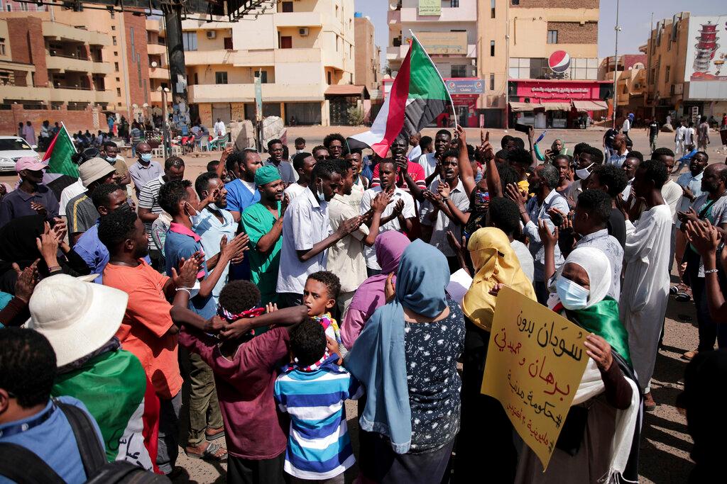 People chant slogans during a protest in Khartoum, Sudan, Oct 30. Pro-democracy groups called for mass protest marches across the country Saturday to press demands for re-instating a deposed transitional government and releasing senior political figures from detention. Photo: AP