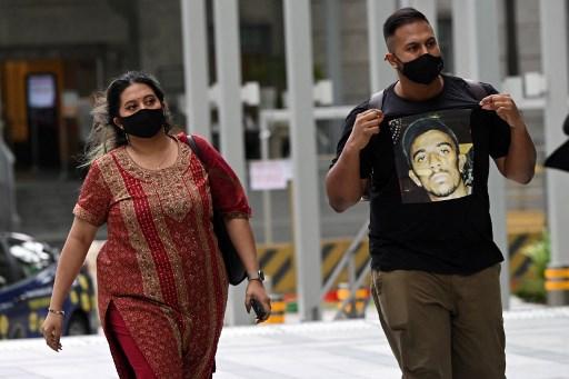 Singaporean rapper Subhas Nair and influencer sister Preetipls arrive at the state courts in Singapore on Nov 1 where he is to be charged over comments on race and religion. Photo: AFP
