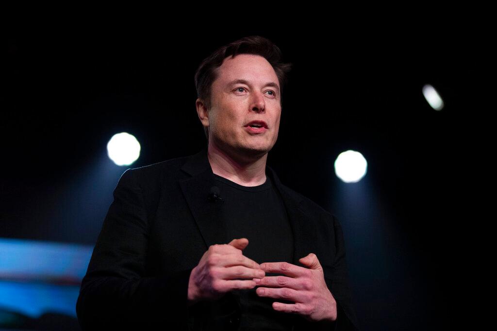 In this March 14, 2019, file photo, Tesla CEO Elon Musk speaks before unveiling the Model Y at the company's design studio in California. Elon Musk polled his more than 62 million followers on whether he should sell 10% of his Tesla shares, by Sunday a majority had voted 'yes.' Photo: AP