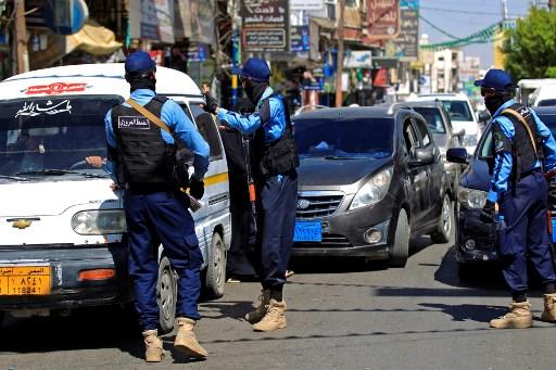 Yemeni police officers control traffic in the capital Sanaa on Nov 2. Tens of thousands of people, mostly civilians, have been killed and millions displaced since the conflict erupted in 2014, in what the UN calls the world's worst humanitarian crisis. Photo: AFP