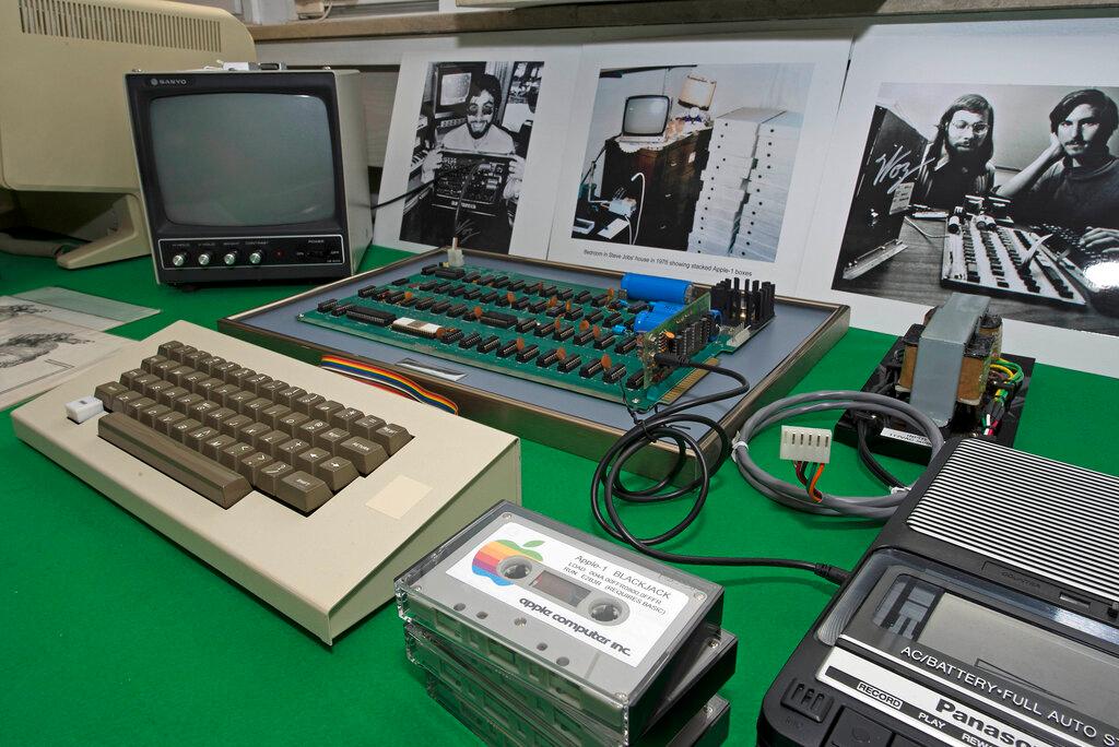 An Apple 1 Computer from 1976 made by Steve Jobs and Steve Wozniak is presented at an auction house in Cologne, Germany, Nov 16, 2013. The so-called 'Chaffey College' Apple-1 is one of only 200 made by Jobs and Wozniak at the very start of the company's odyssey from garage start-up to megalith worth US$2 trillion. Photo: AP