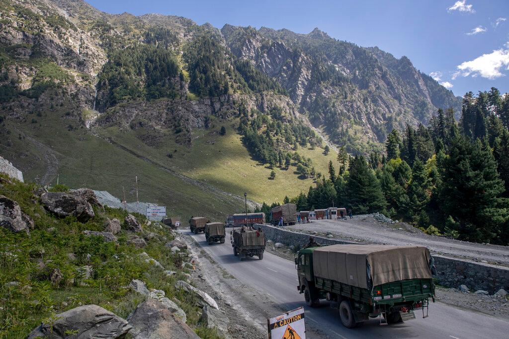 In this Sept 9, 2020, file photo, an Indian army convoy moves on a highway in Indian-controlled Kashmir. Around 5,000 extra paramilitaries in all were being deployed from this week, including from India's Border Security Force, according to a police officer. Photo: AP
