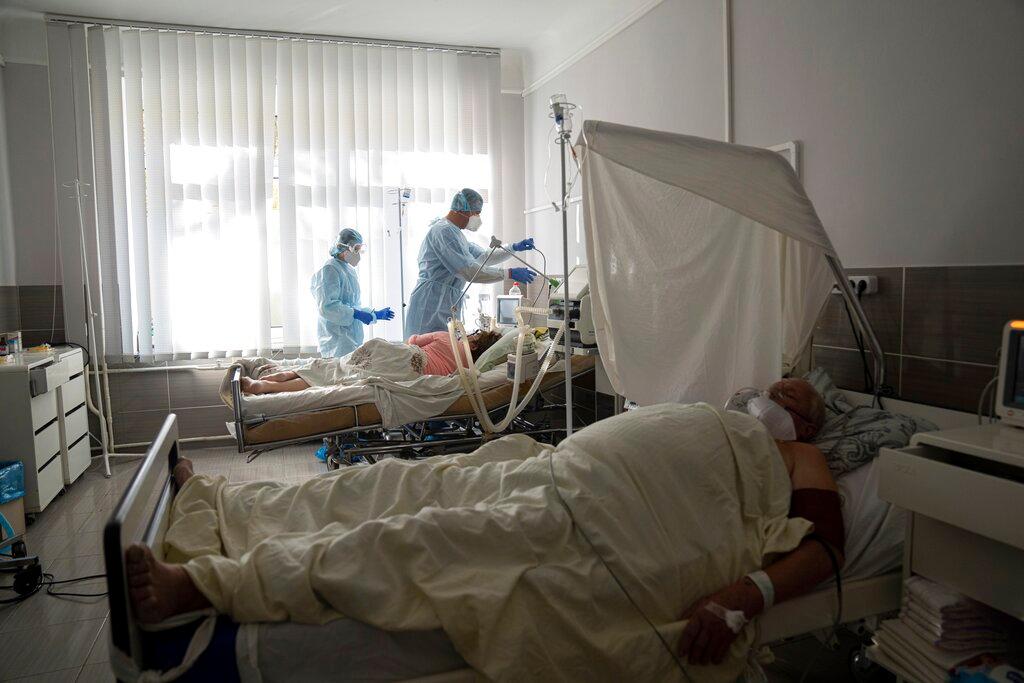 Medical staff treat a Covid-19 patient at the ICU of a city hospital in Rivne, 300km west of Kiev in Ukraine. Photo: AP