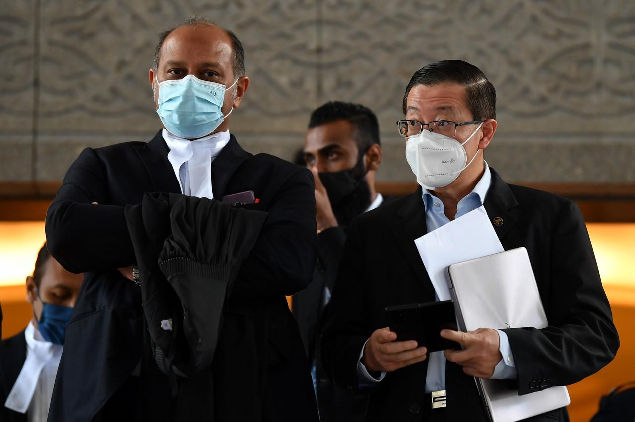 Former Penang chief minister Lim Guan Eng (right) with his lawyer Gobind Singh Deo at the Court of Appeal in Putrajaya today. Photo: Bernama
