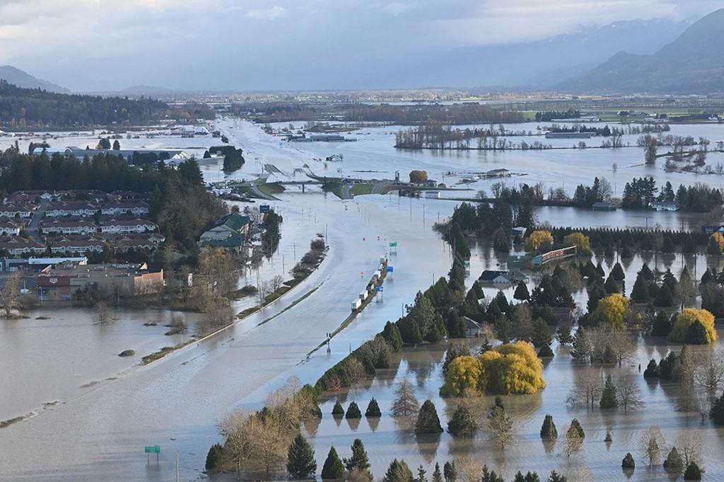 This aerial handout image taken and released on Nov 16 by the City of Abbotsford shows flooding on the Sumas Prairie in Abbotsford, Canada. At least one person has died in torrential rains that forced thousands in western Canada to evacuate their homes and trapped motorists in mudslides. Photo: AFP