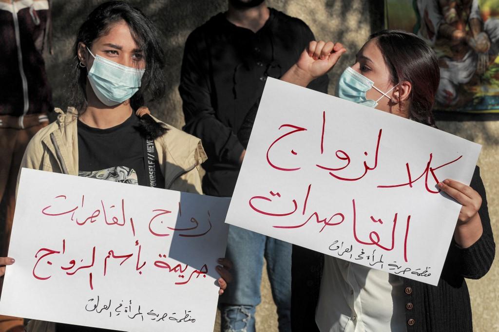 Women demonstrate near the Kadhimiya court in Iraq's capital Baghdad on Nov 21, in protest against the legalisation of a marriage contract for a 12-year-old girl. Photo: AFP